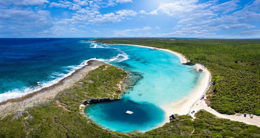 Panoramic,Aerial,View,To,Dean's,Blue,Hole,With,The,Connecting