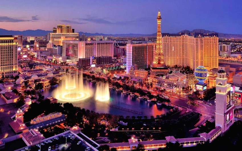 City skyline at night with Bellagio Hotel water fountains, Las Vegas, Nevada, America, USA