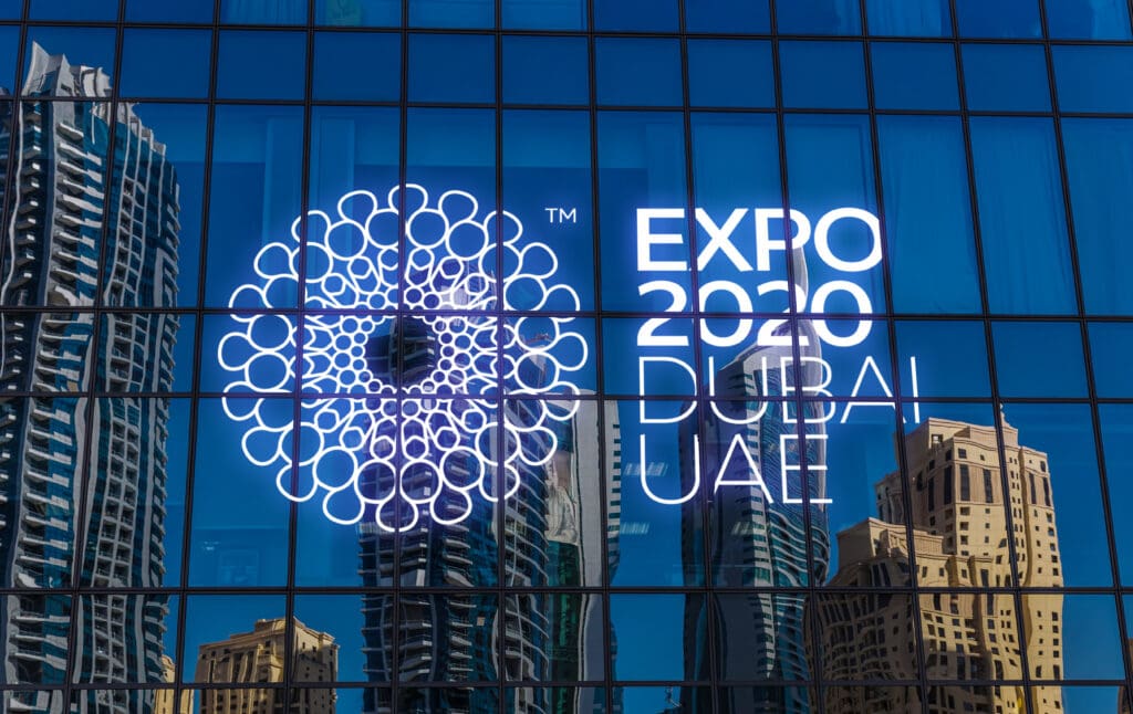 Dubai,,Uae,-,August,27:,Skyscrapers,In,Reflection,On,Blue