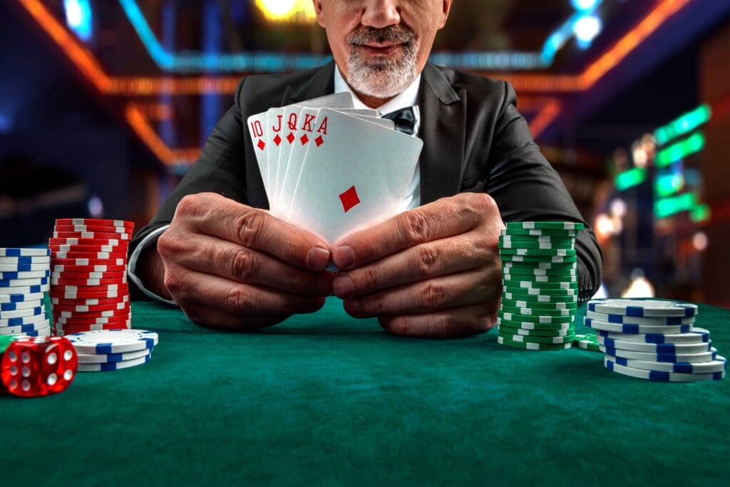 Gambling,Concept.,Close,Up,Of,Poker,Player,Male,Hand,Winning