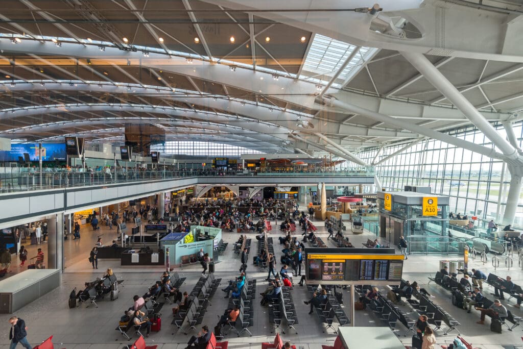 London,-,May,21,,2015:,People,Walking,Inside,Terminal,Of