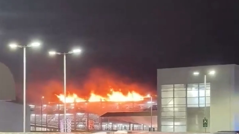 Flights have been suspended until at least 3pm at Luton airport after a major fire last night.