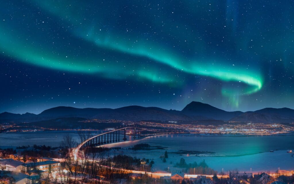 Aurora,Borealis,Or,Northern,Lights,In,The,Sky,Over,Tromso