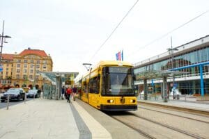 Modern,Urban,Public,Transportation.,The,Yellow,Streetcar,Picks,Up,Passengers